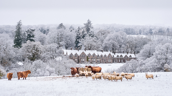 Cargill with snow and Ballathie hotel &copy; George Logan